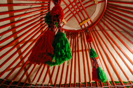 Yurt interior. Shanyrak impotant element of traditional Kyrgyz tent. Tunduk symbol in center. High quality photoの写真素材
