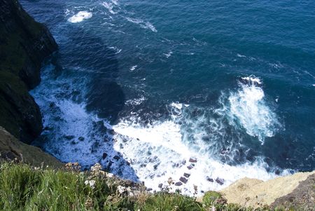 Looking down the Cliffs of Moher in Irelandの写真素材