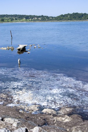 Pollution problem, contaminated water at the shore .の写真素材