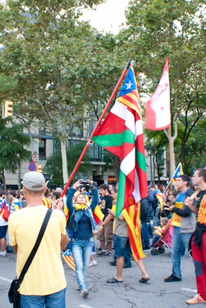 BARCELONA, SPAIN  SEPTEMBER 11ST  Unidentified Catalonian citizens show they support to the Catalunya Independence on 11 September 2013 during the  Diada  celebrations in Barcelona のeditorial素材