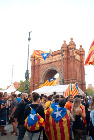 BARCELONA, SPAIN  SEPTEMBER 11ST  Unidentified Catalonian citizens show they support to the Catalunya Independence on 11 September 2013 during the  Diada  celebrations in Barcelona のeditorial素材