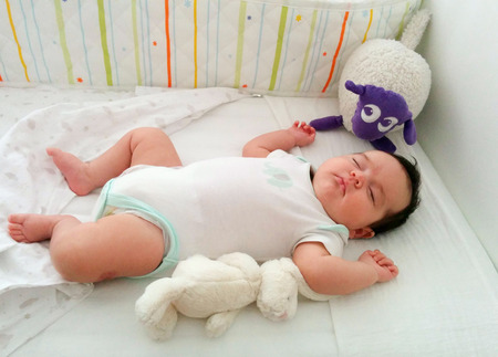 Cute New born baby girl under three months old