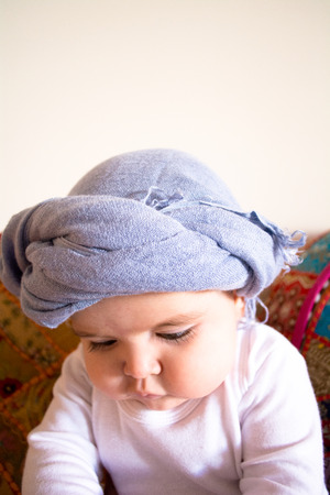 Baby doing yoga and meditatingの写真素材