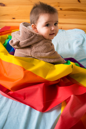 Baby bear and a rainbowの写真素材