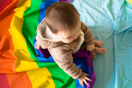 Baby bear and a rainbowの写真素材
