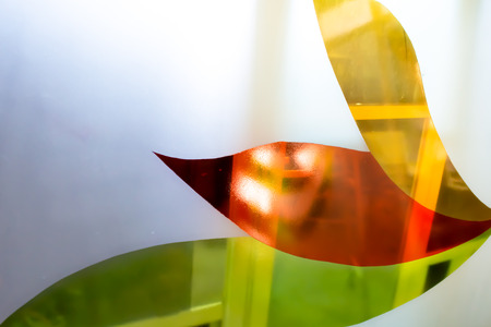 Colorful painted glass. Handmade work ideal for abstract backgrounds.の写真素材