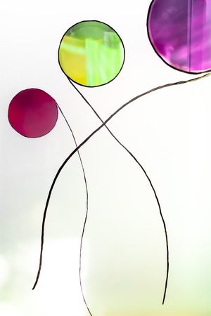 Colorful painted glass. Handmade work ideal for abstract backgrounds.の写真素材