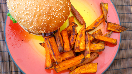 Vegetarian meal with yummy sweet potato chipsの写真素材