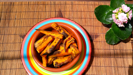 Vegetarian meal with yummy sweet potato chipsの写真素材