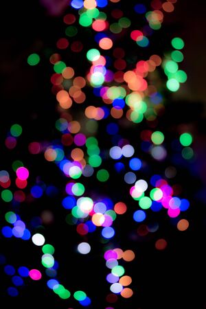 colorful bokeh background ideal for Christmas cards, pictures and several design projectsの写真素材