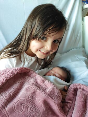 Lifestyle: Family life. Newborn baby. Happy moments.の写真素材