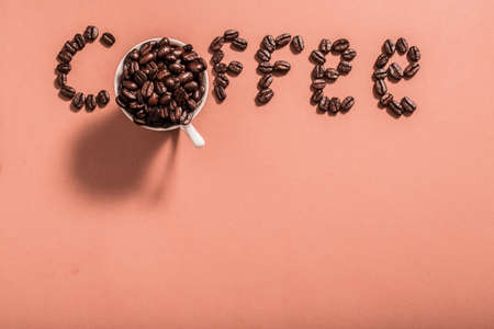 Coffee Beans in shape of Word with cupの写真素材