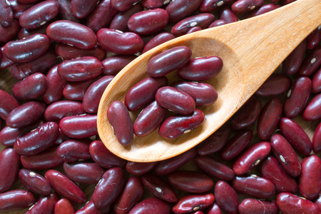 image red kidney beans in wooden spoon
