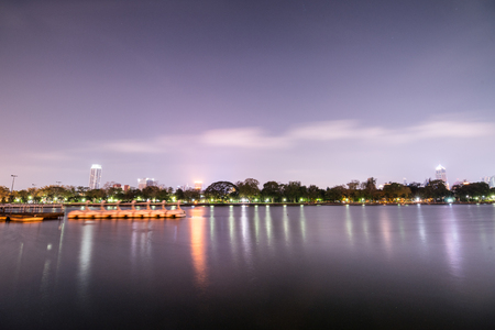 Bangkok city downtown at night with reflection of skyline, Bangkok,Thailandの写真素材