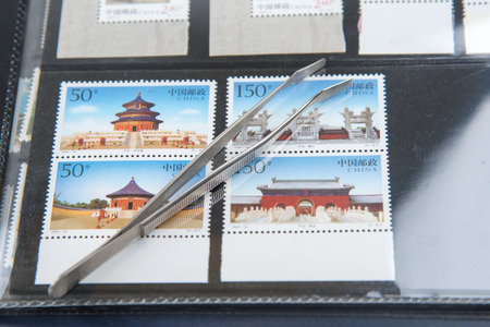 postage stamps in a collector albumの写真素材