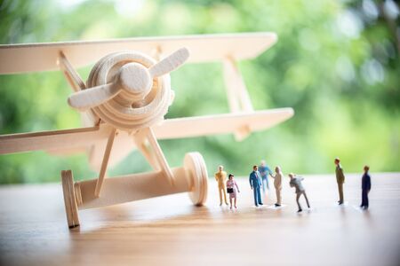 Retro wooden airplane toy with miniatureの写真素材