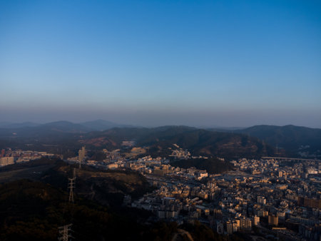 Sunset view of the city of Seoul from the top of the mountainの写真素材