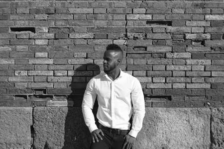 African-American man on a business trip to Europe takes advantage of a few days to go sightseeing in Seville. Spain.の写真素材