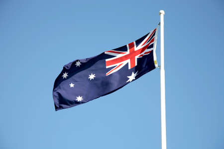 The Australian flag blowing in the windの写真素材