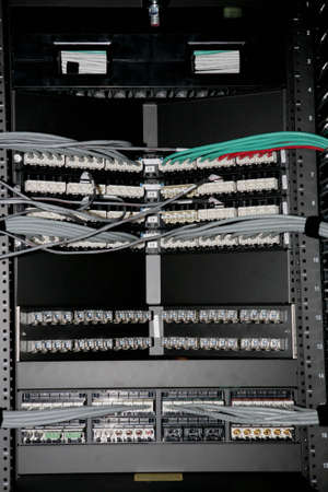 Back of a computer with capels and wires