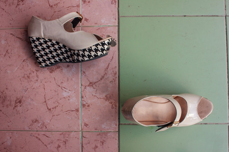 modern fashion high heels on the different color floorの写真素材