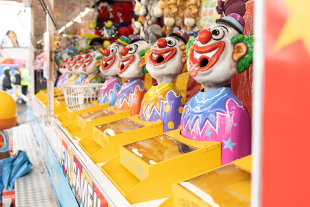 Laughing clowns game attraction at a fair carnivalの写真素材