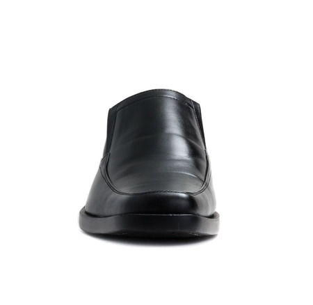 Black glossy man shoe isolated on white backgroundの写真素材