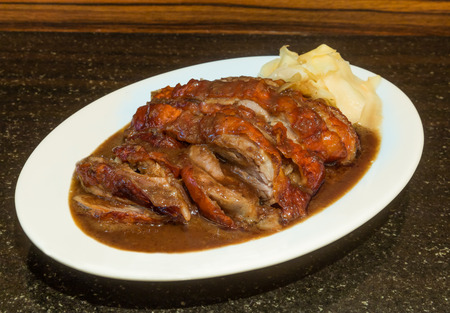 Delicious Roast Duck on black stone backgroundの写真素材
