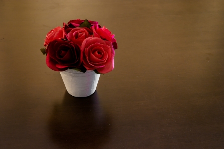 Roses on a table and space for textの写真素材