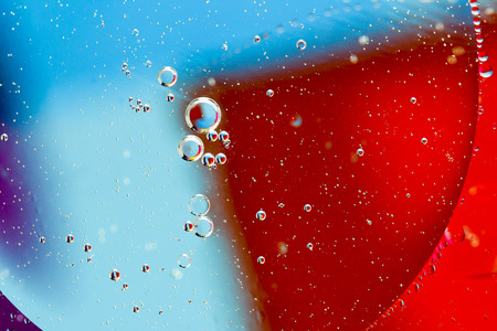 Oil floating on waterの写真素材