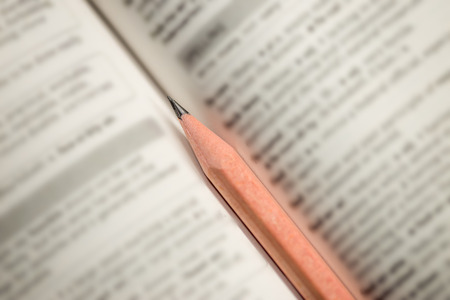 Pencil on dictionaryの写真素材