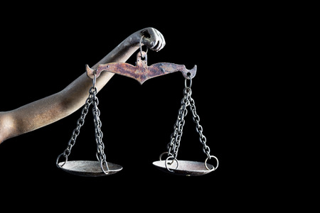 Lady Justice's and holding Scale of Justice isolated on black bbackground and space for text
