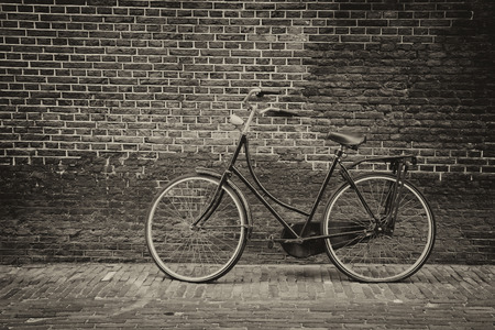 Bike against brick wallの写真素材