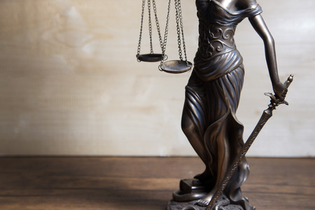 Scale of justice held by Lady Justiceのeditorial素材