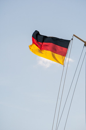Germany flag on skyの写真素材