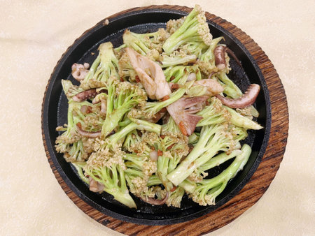 Stir-fried Chinese cabbage with pork and squid in a panの写真素材