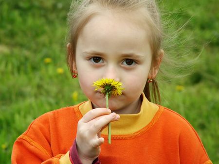 Smelling the flowerの写真素材