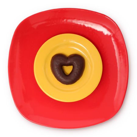 Top view of chocolate heart on platesの写真素材