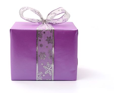 Isolated purple gift box with silver ribbonの写真素材