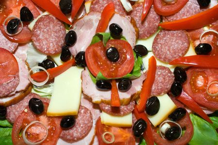 Sliced food; ham, cheese, pepper and olive の写真素材