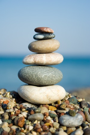 Differently sized and colored pebbles, stackedの写真素材