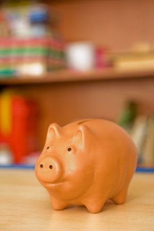 Clay piggy bank in the children's roomの写真素材