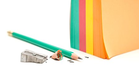 Notes block and sharpened graphite pencil ready to useの写真素材