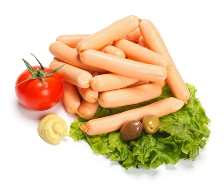 Weenie sausages with mustard and various vegetablesの写真素材