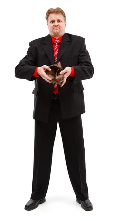 Poor man showing his empty wallet. Financial crisis concept, people left without money, zero buying powerの写真素材