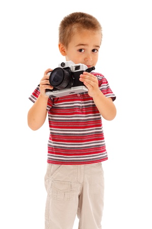Serious little boy taking photosの写真素材