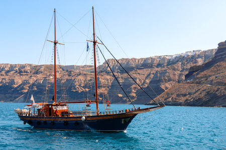Greek sailing ship on the sea, aproaching the harborの写真素材