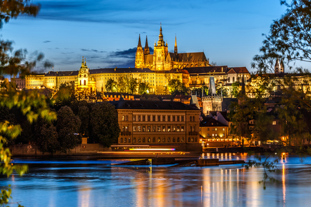 View of Saint Vitus Cathedral and Vltava river in evening lights, Prague, Czech Republic, 2016の写真素材
