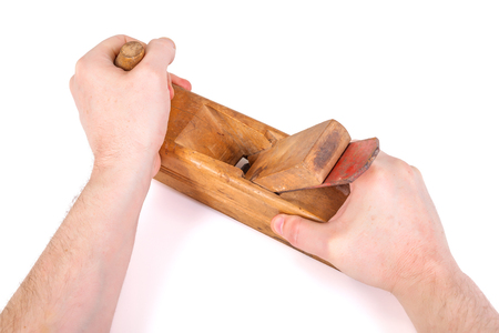 Woodworker showing the right position of the hand planeの写真素材
