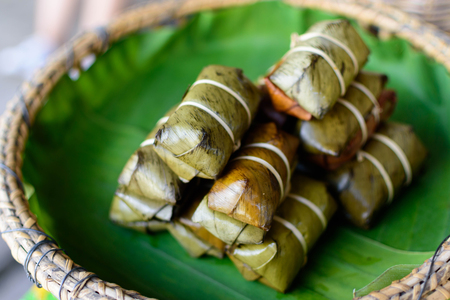 Bananas with Sticky Rice in Banana Leaf Selective Focus Dessert Thail Food Deliciousの写真素材